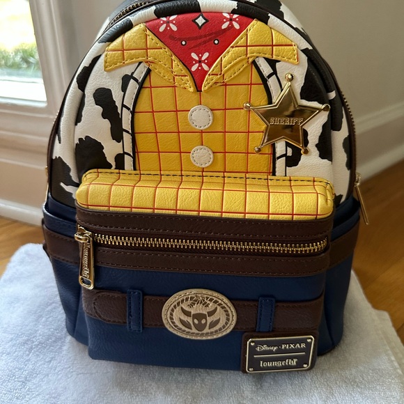 Loungefly Handbags - Disney Pixar Loungefly Woody Mini Backpack